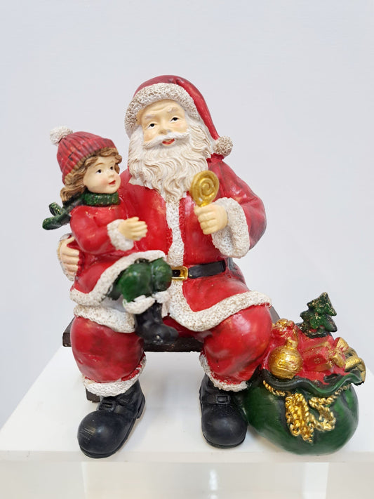 Father Christmas and little girl